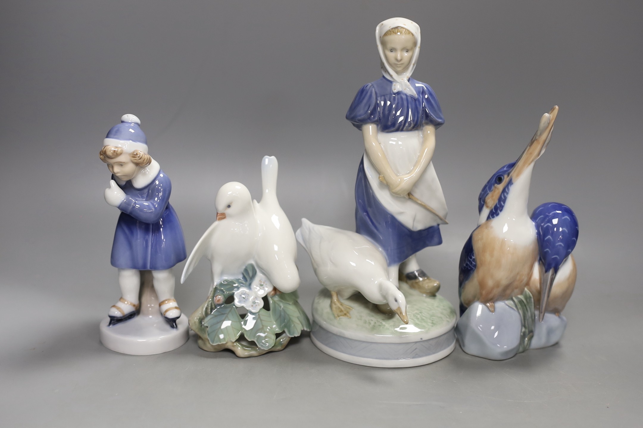 Two Royal Copenhagen figurines and two bird groups- tallest girl with duck 23 cms high.